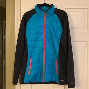 Champion blue/black nylon and polyester jacket.